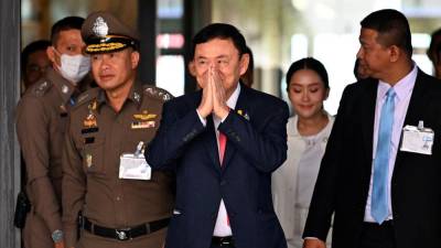 ex-pm-thaksin-returns-to-thailand-after-15-years-in-exile