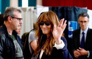 carla-bruni-charged-in-sarkozy-campaign-probe-in-france