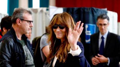 carla-bruni-charged-in-sarkozy-campaign-probe-in-france