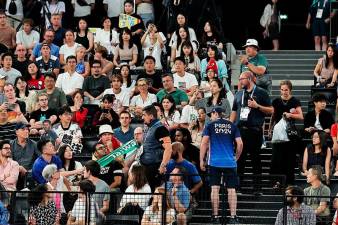 olympics-badminton-spectator-dragged-from-arena-for-holding-up-taiwan-banner